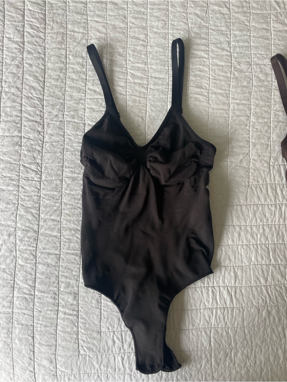 Skims thong bodysuit in onyx